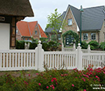 SOriginal Sylter Friesenzaun - Weißer Gartenzaun aus wertvollem ODUM IROKO Hartholz - Anfertigung nach Maß von Peters + Peters.